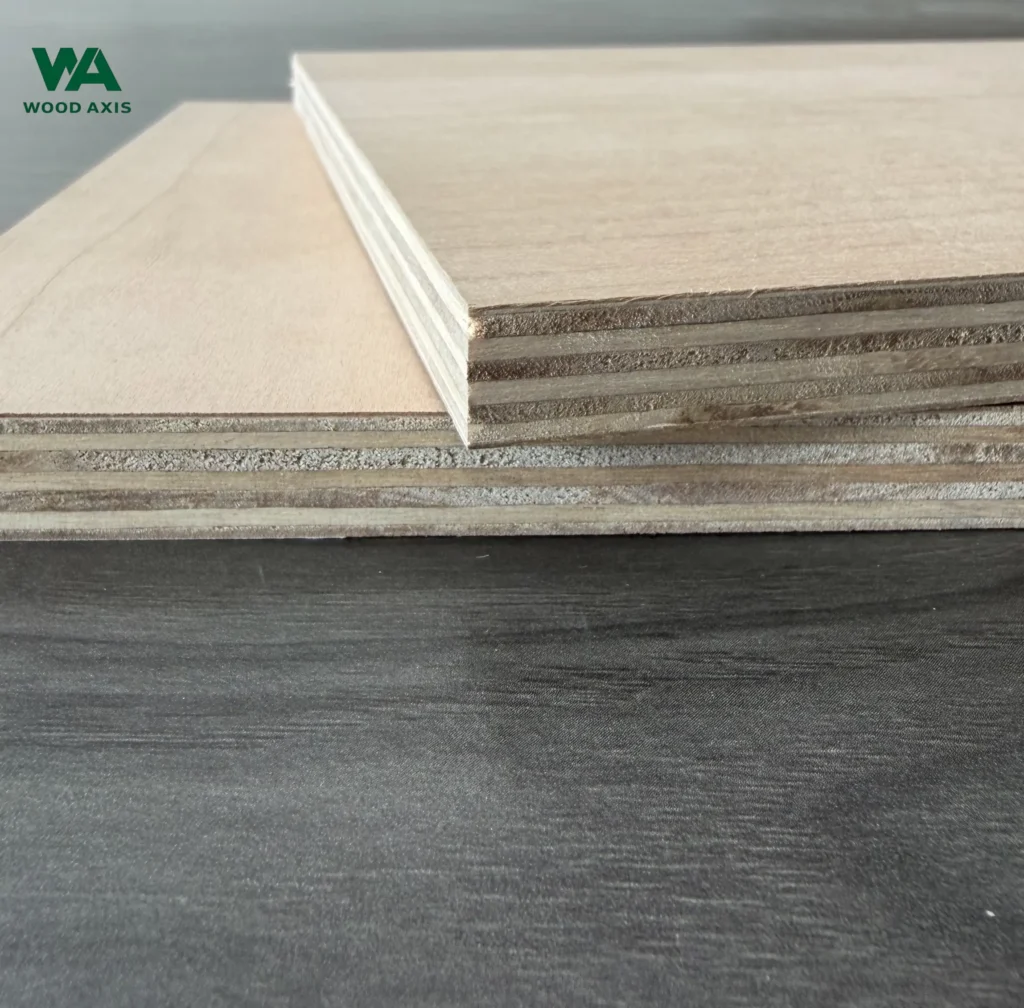Technical macro photo of a crisp, precision CNC router cut on a cherry plywood board, demonstrating zero face veneer chipping, tearing, or splintering along the tight cut line.