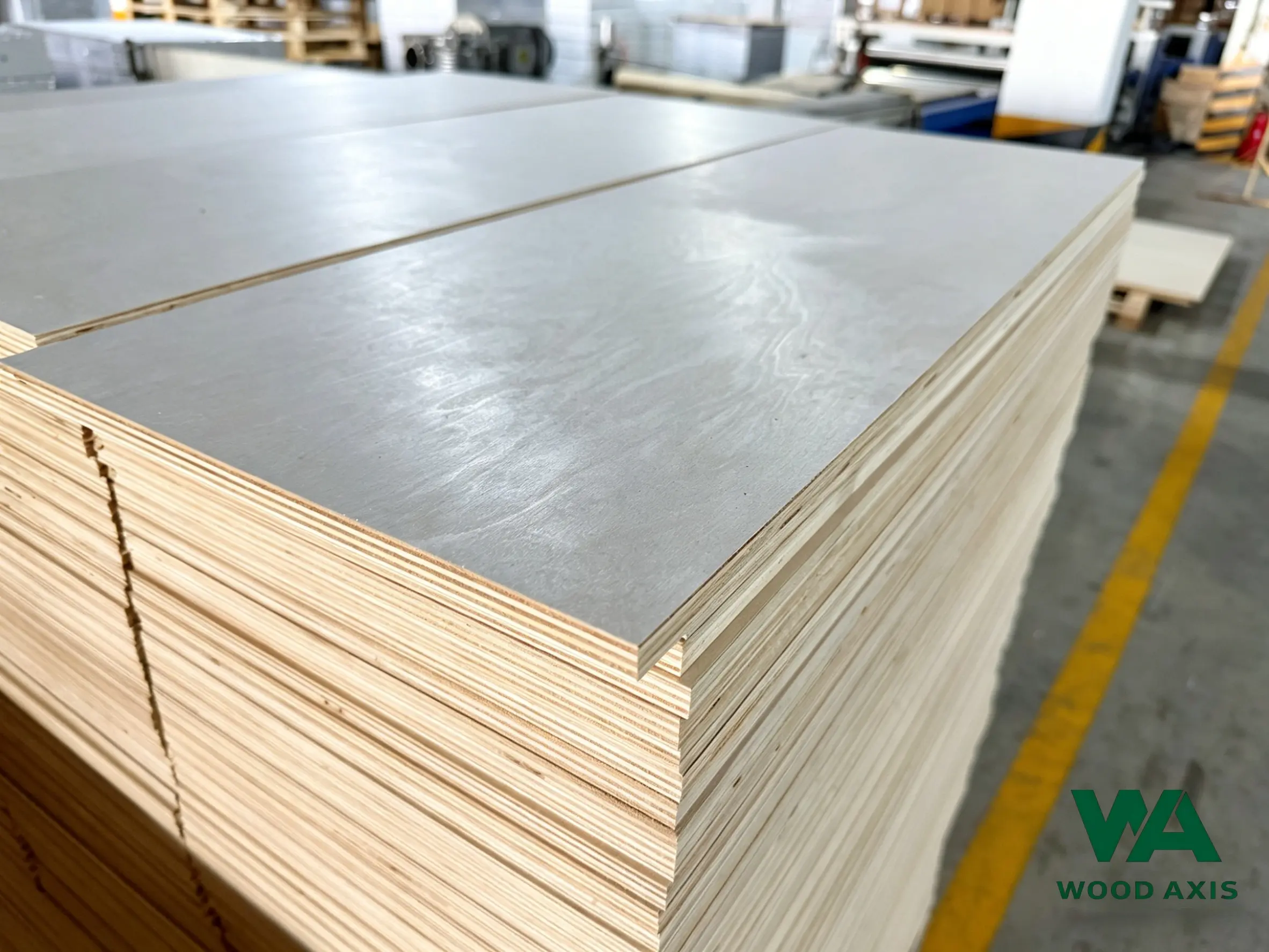 Large stock of premium birch plywood sheets bundled for wholesale export.