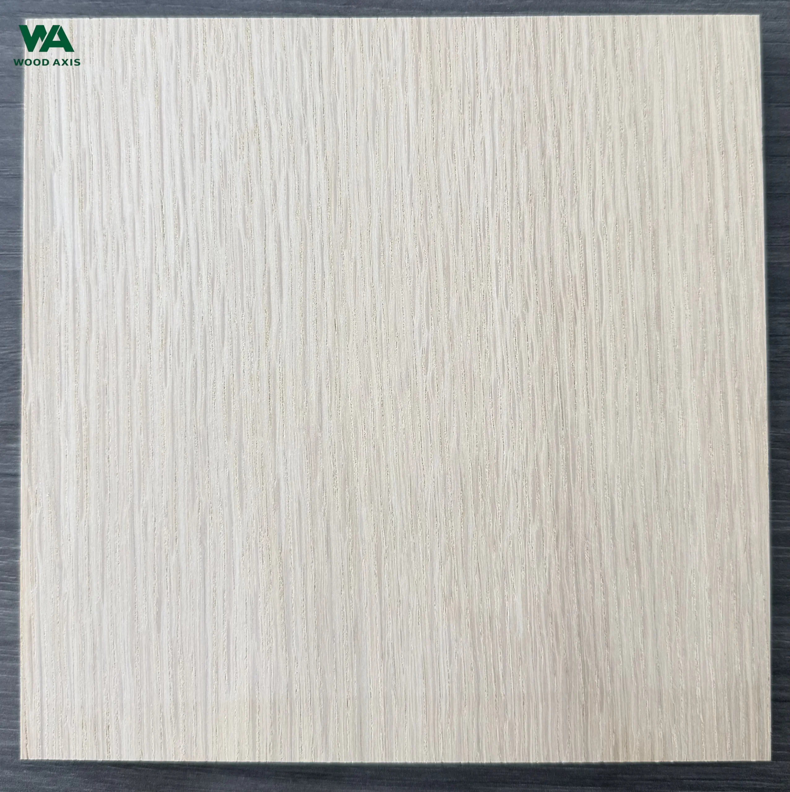 Detail view of white oak plywood edge showing the clean, multi-layer veneer core construction and a smooth face.