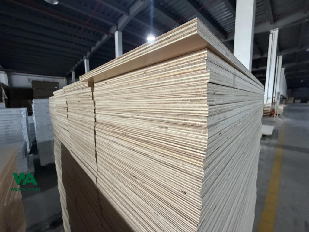 How U.S. Plywood Final AD and CVD Determination Will Impact American Cabinet Manufacturers 1 Neatly stacked wooden plywood sheets stored in a warehouse for export