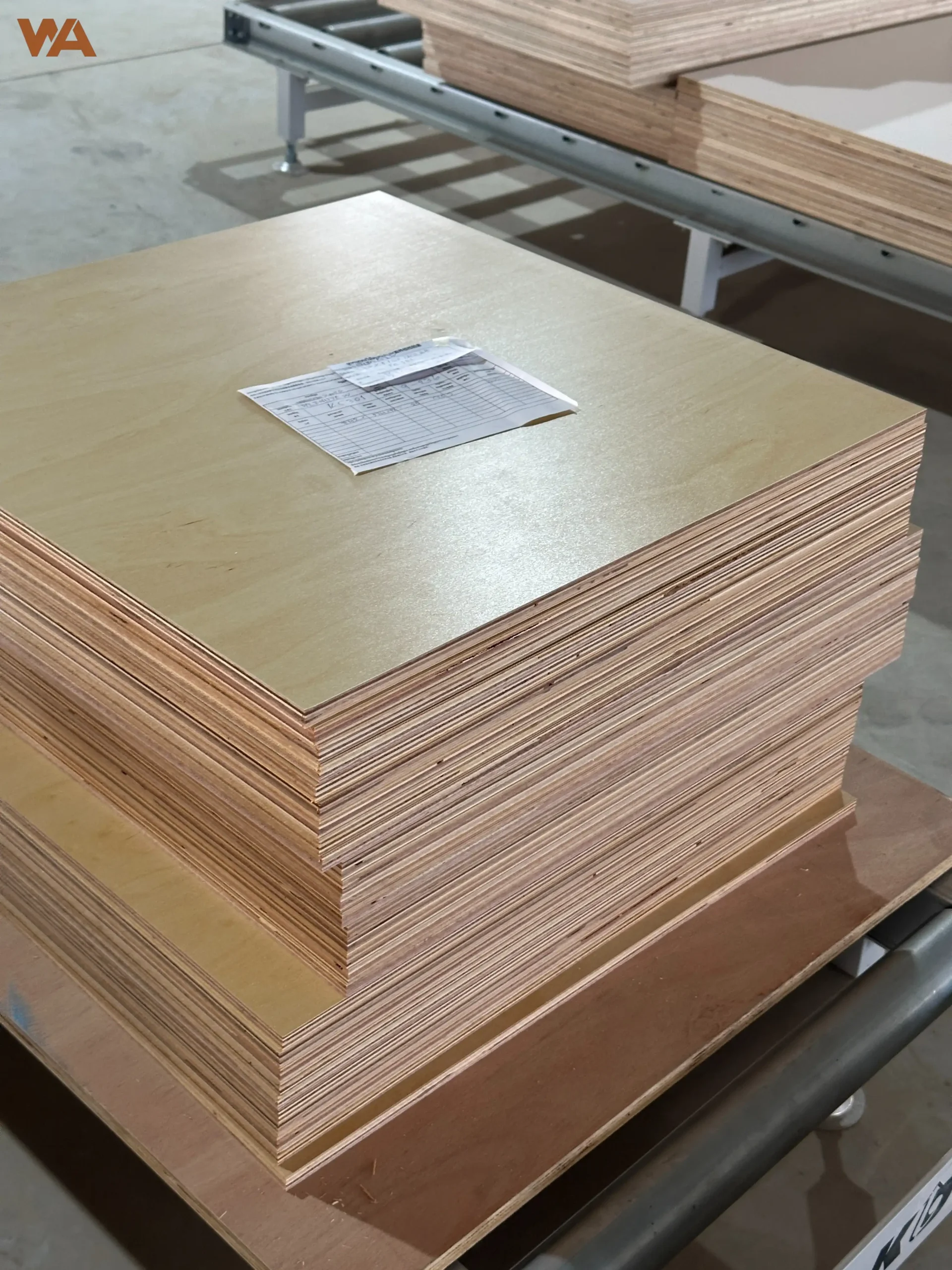 Close-up view of stacked high-grade Birch plywood panels showing core layer construction and uniform thickness